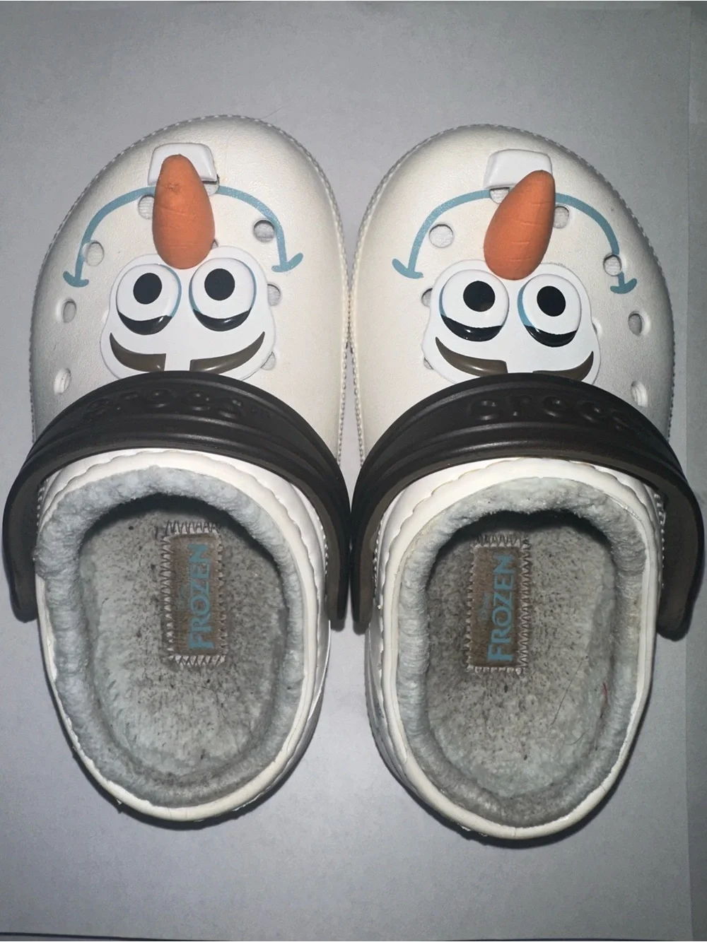 CROCS Kids' Olaf Clogs in White with Orange and Black Details
